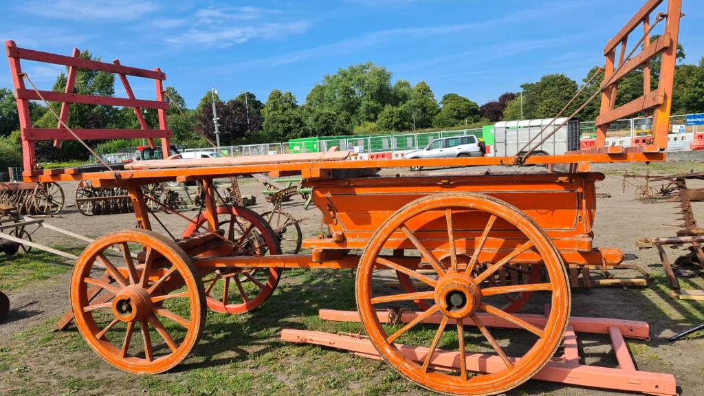 A rare Hermaphrodite farm vehicle which alters from a four wheeled wagon to a two wheeled farm cart